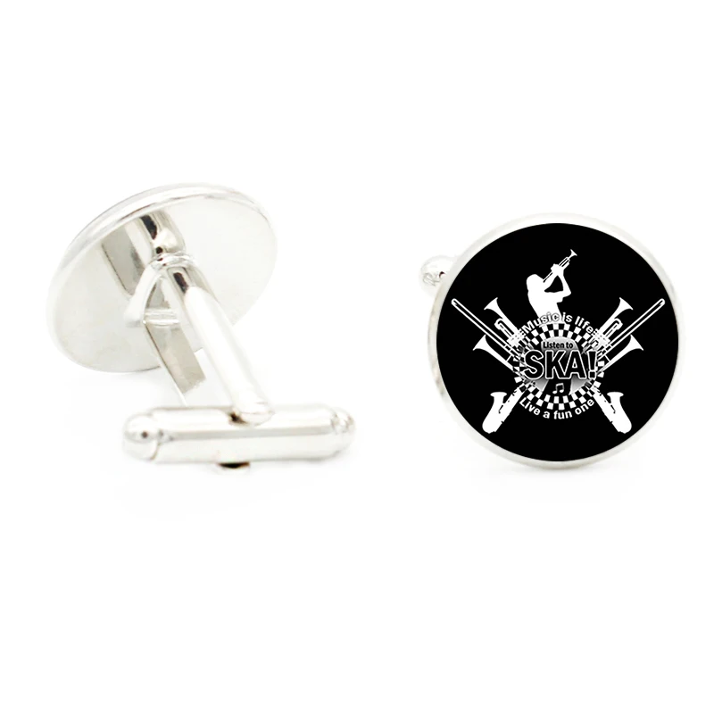 bouton de manchette musical